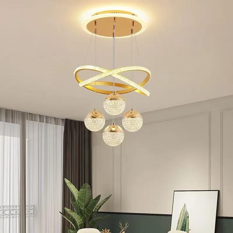 Lámpara Colgante LED Dorada con Anillos y 5 Esferas de Cristal